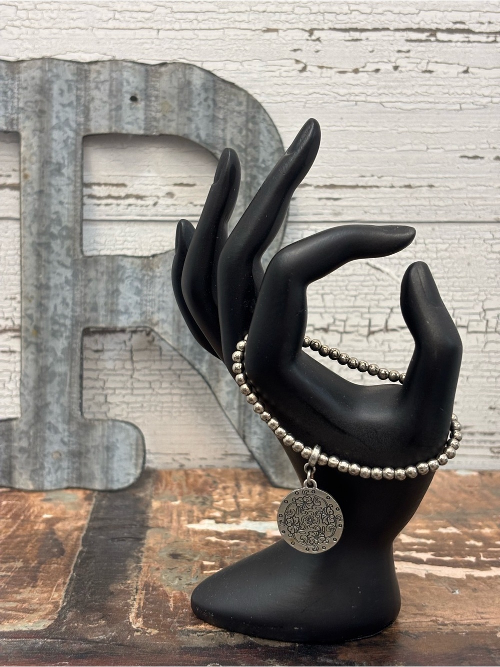Etched Charm Stretchy Silver Beaded Bracelet with Decorative Round Pendant